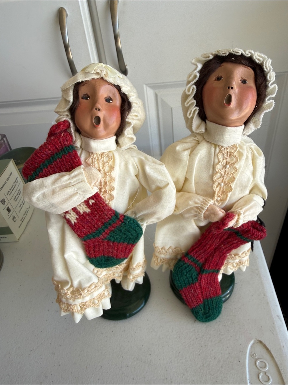 Pair of Cream Victorian-Style Caroler Dolls with Red & Green Stockings